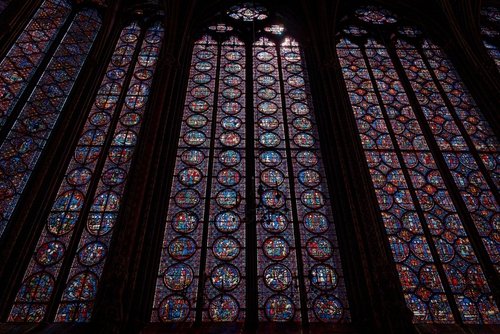 Rich decorated interior of the Gothic Medieval Sainte Chapelle - a royal chapel in Paris, France