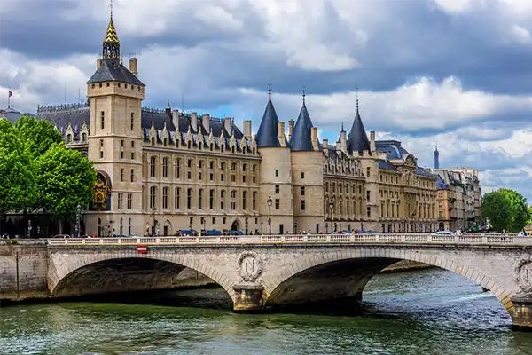 Castle Conciergerie - former royal palace and prison. Conciergerie located on the west of the Cite Island and today it is part of larger complex known as Palais de Justice. Paris, France.
