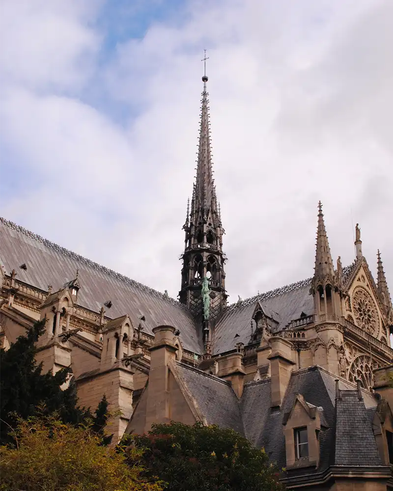 View of a part of the cathedral Notre Dame de Paris in autumn.